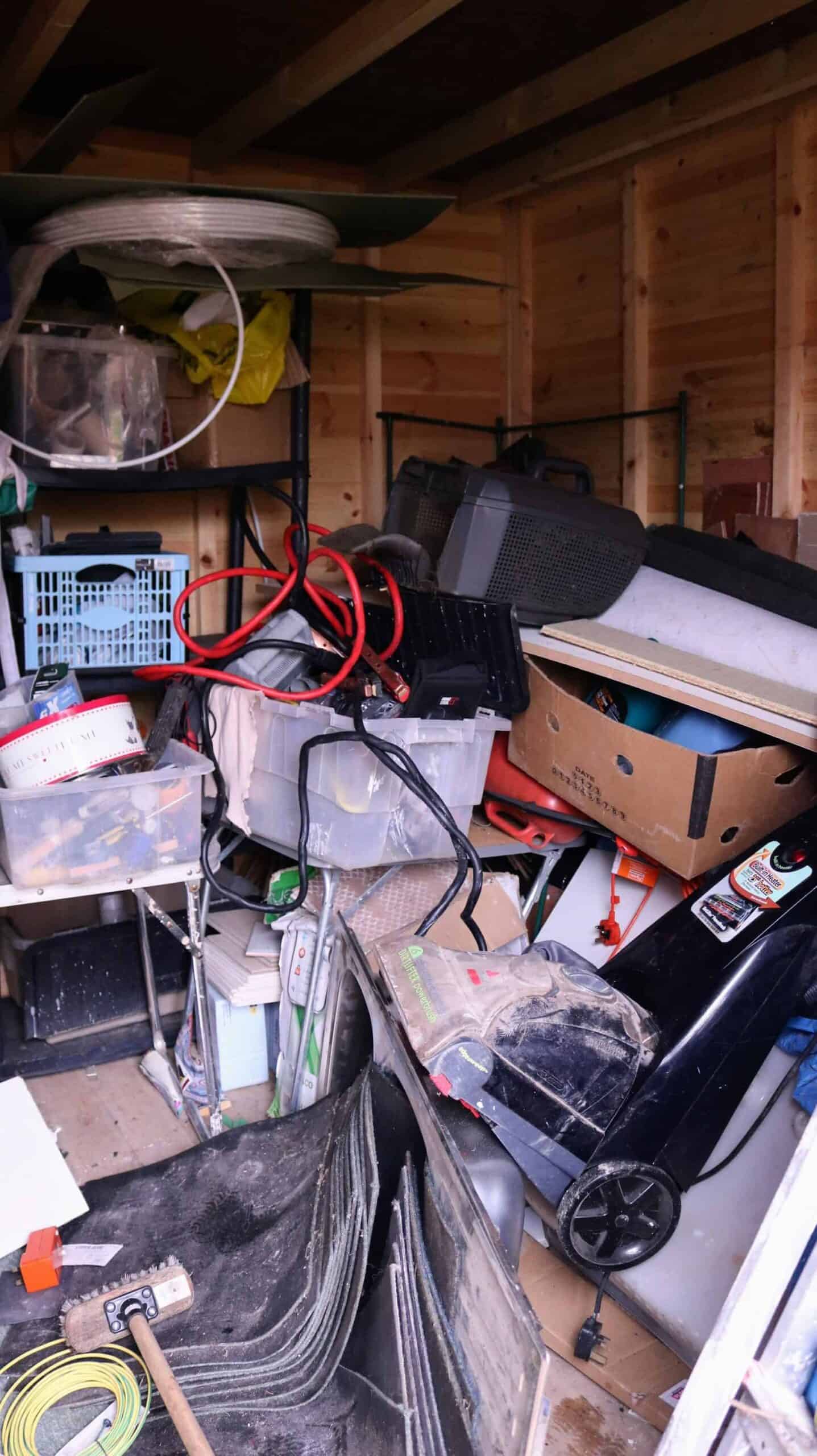 messy cluttered unorganised garden shed