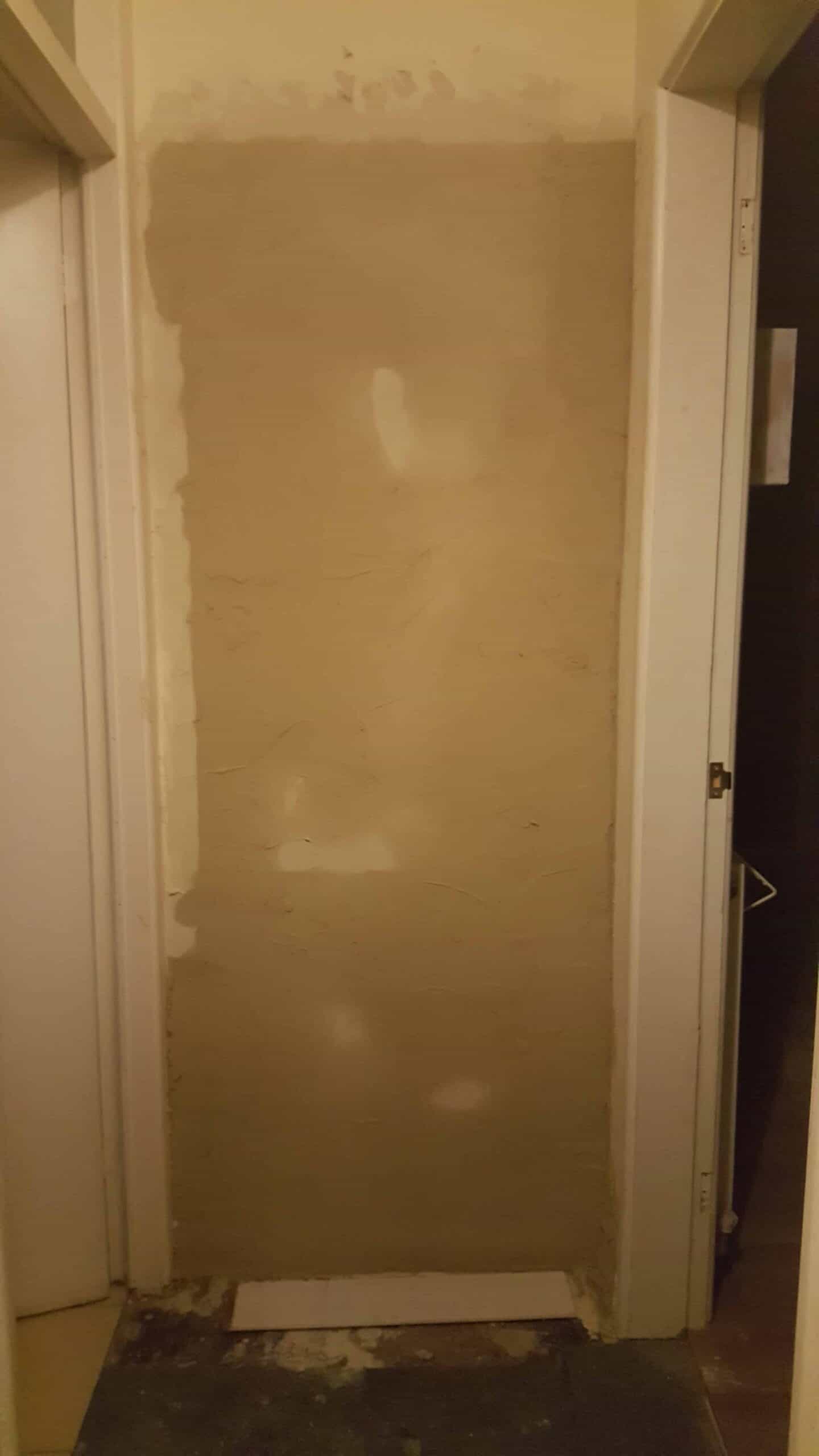 waiting for plaster to dry on a wall before decorating