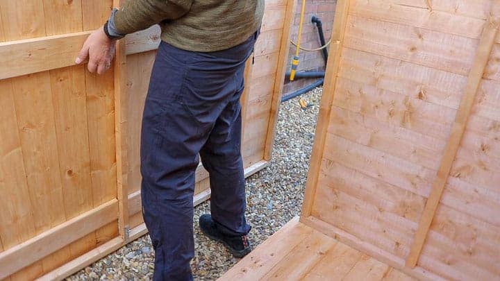 placing door front on shed