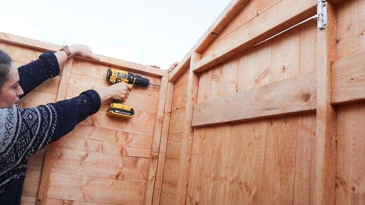 screwing on shed front