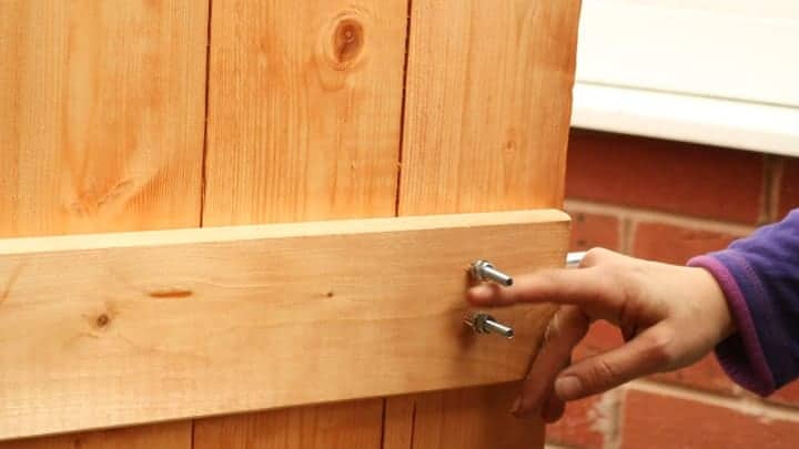 adding washers and nuts behind a shed lock