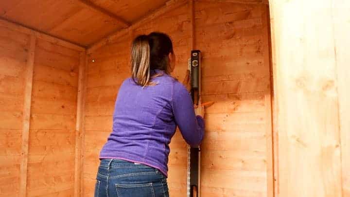 making twin slot rails plumb to wall