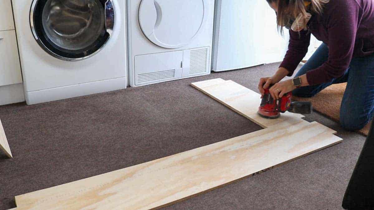 sanding softwood plywood shelf for desk over treadmill