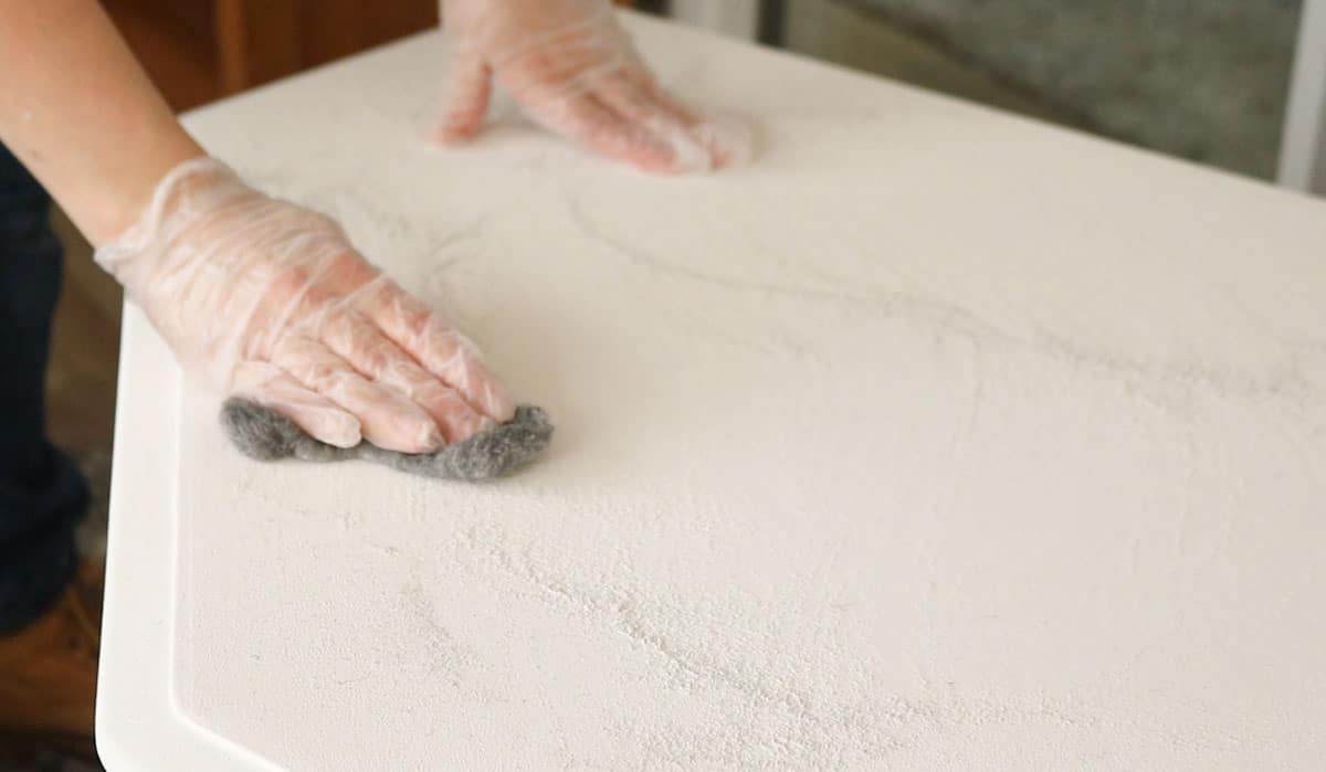 distressing chalk paint with fine wire wool