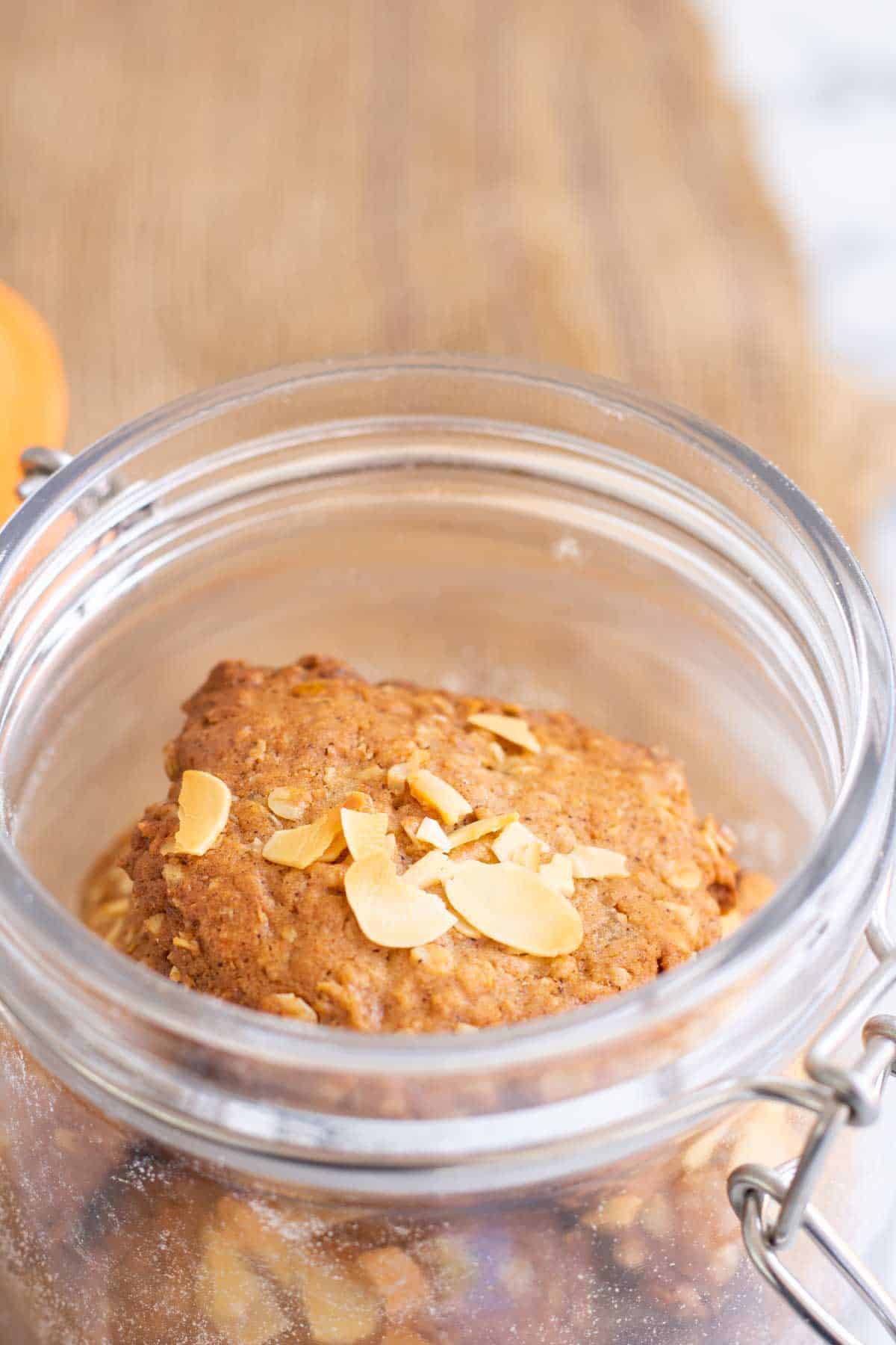 easy biscuit recipe in a cookie jar topped with almonds
