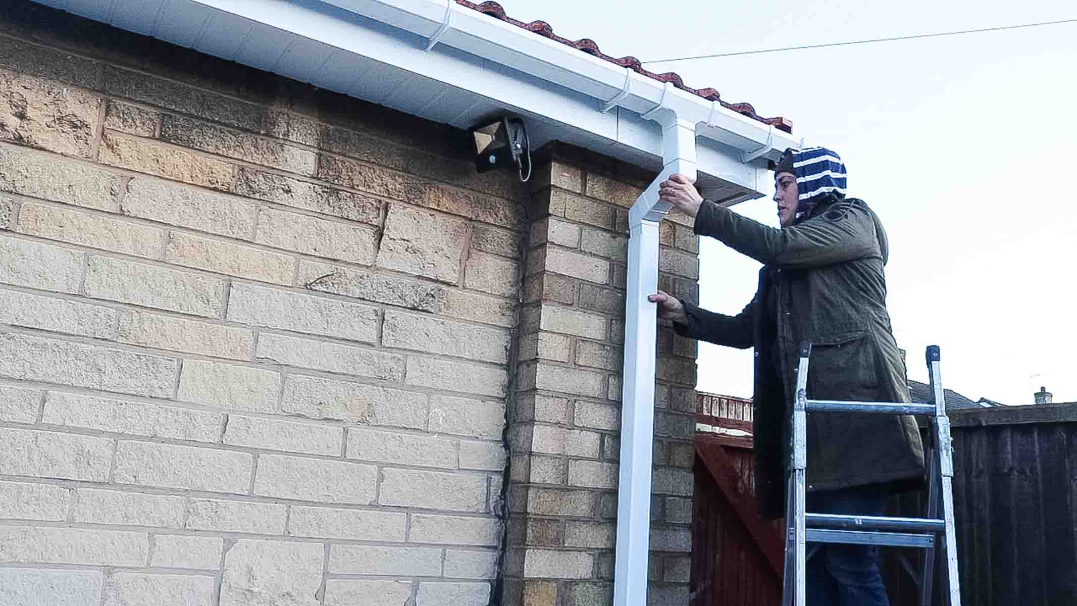 slotting down pipe to guttering before mounting