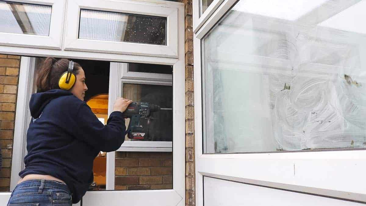 Screwing UPVC window frame to brickwork with a Spax screw