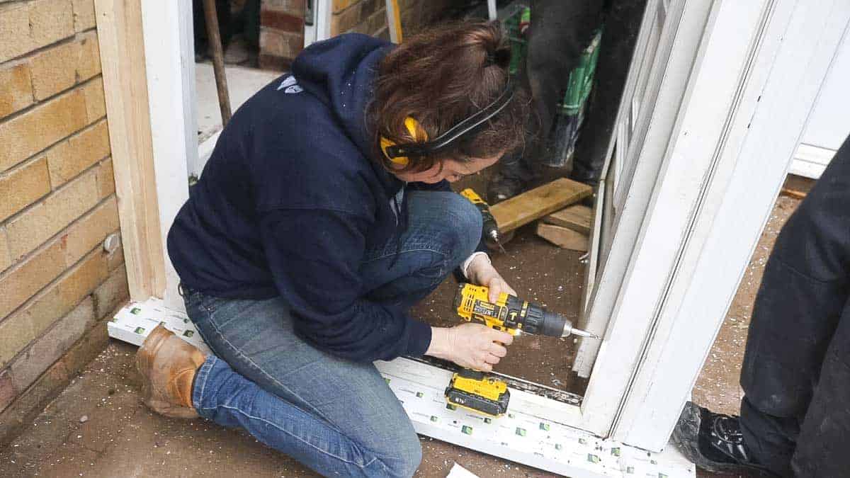 Screwing UPVC door to bay pole