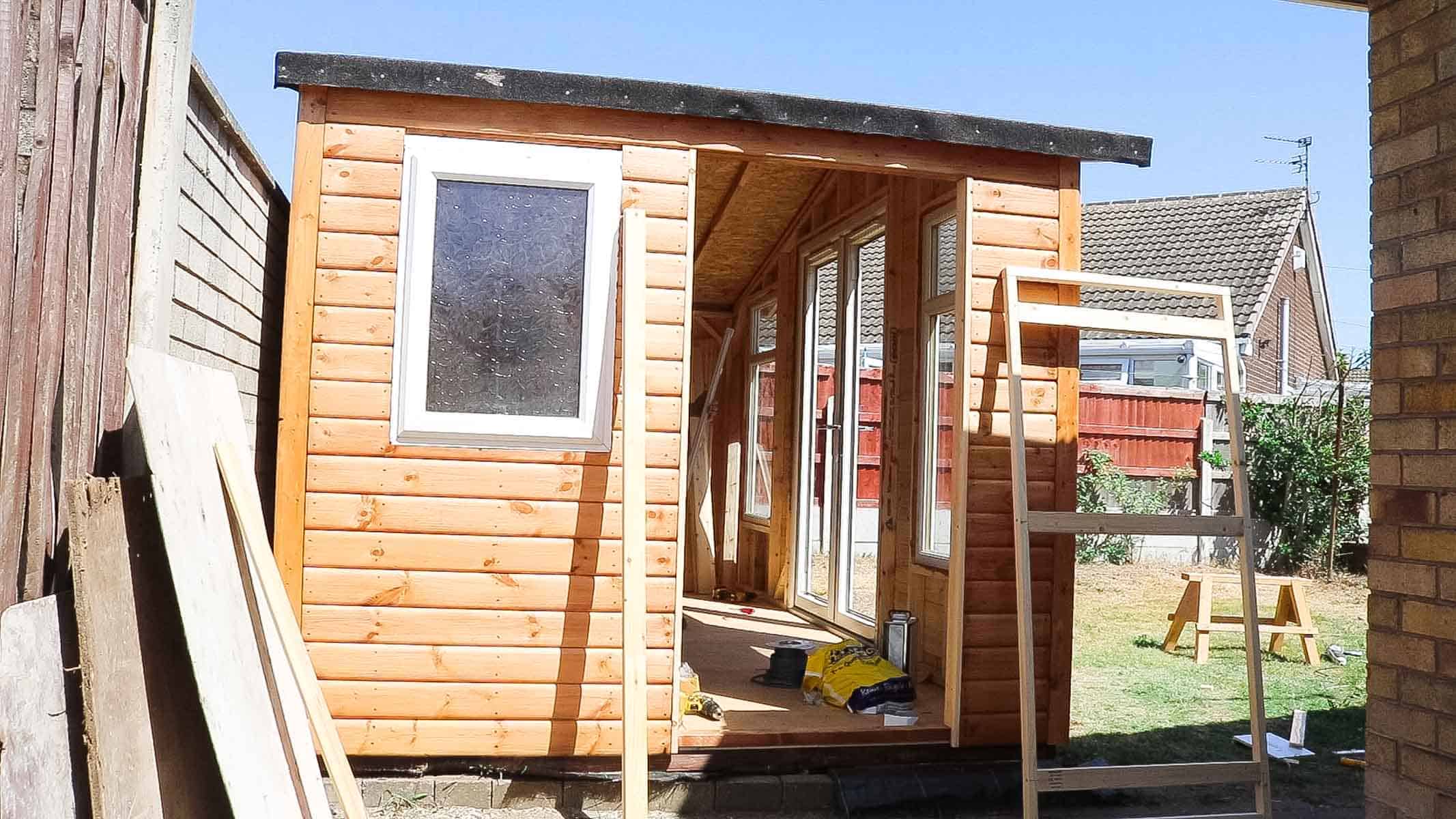 door frame for door shed at side of summerhouse shed