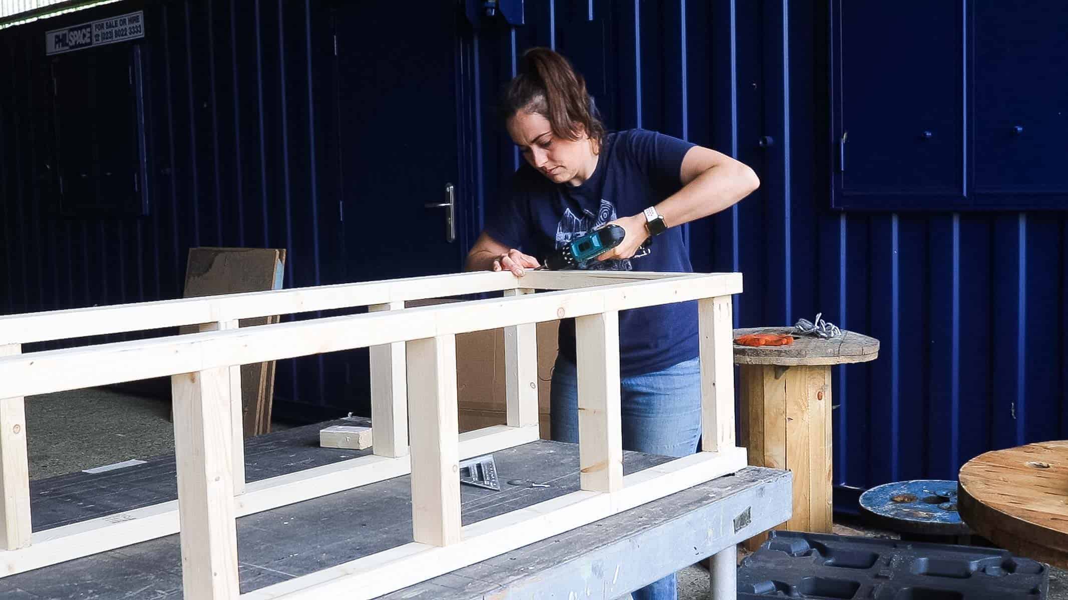 Screwing a bookcase frame together