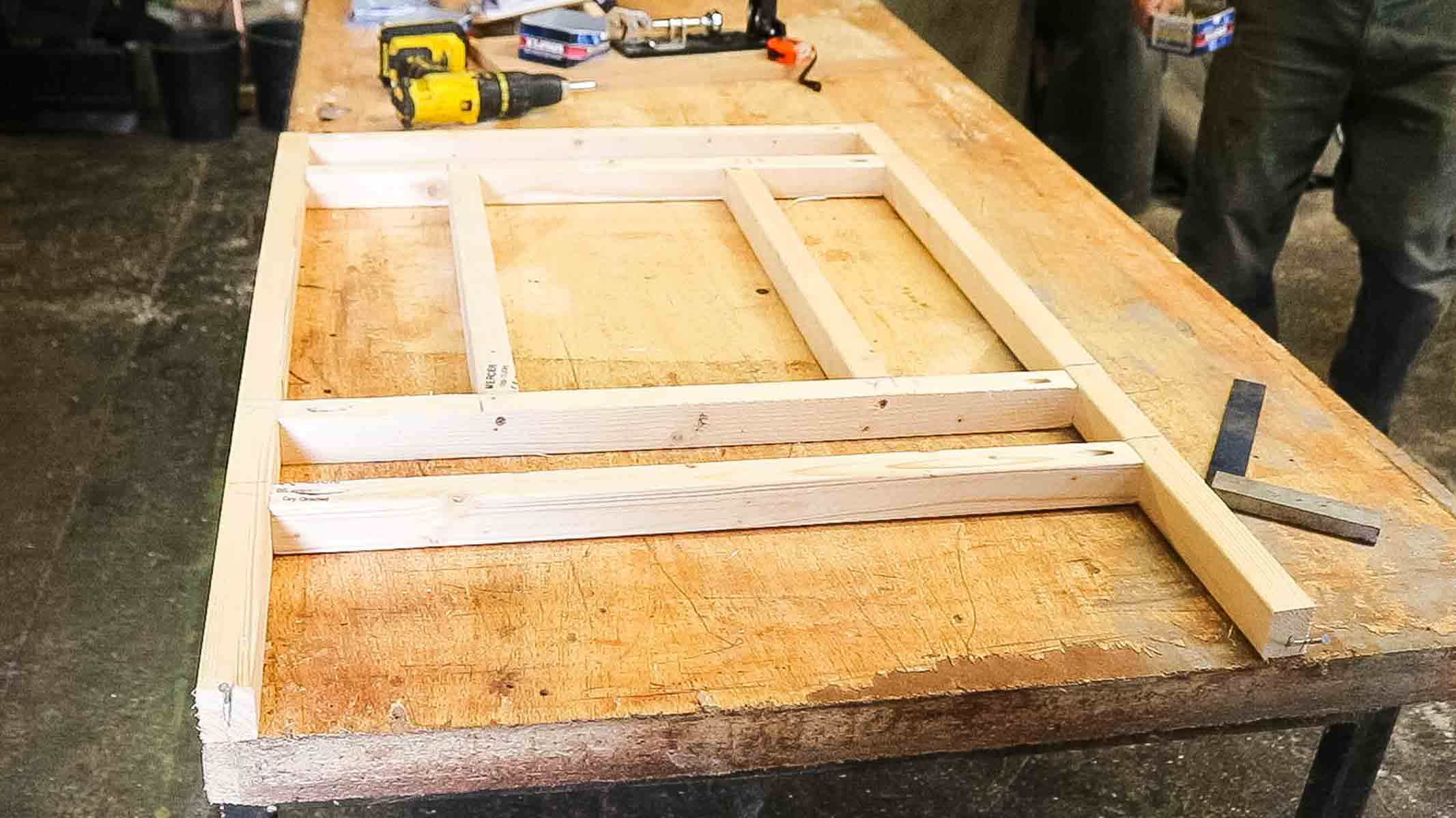 small chicken coop framework for drop door opening