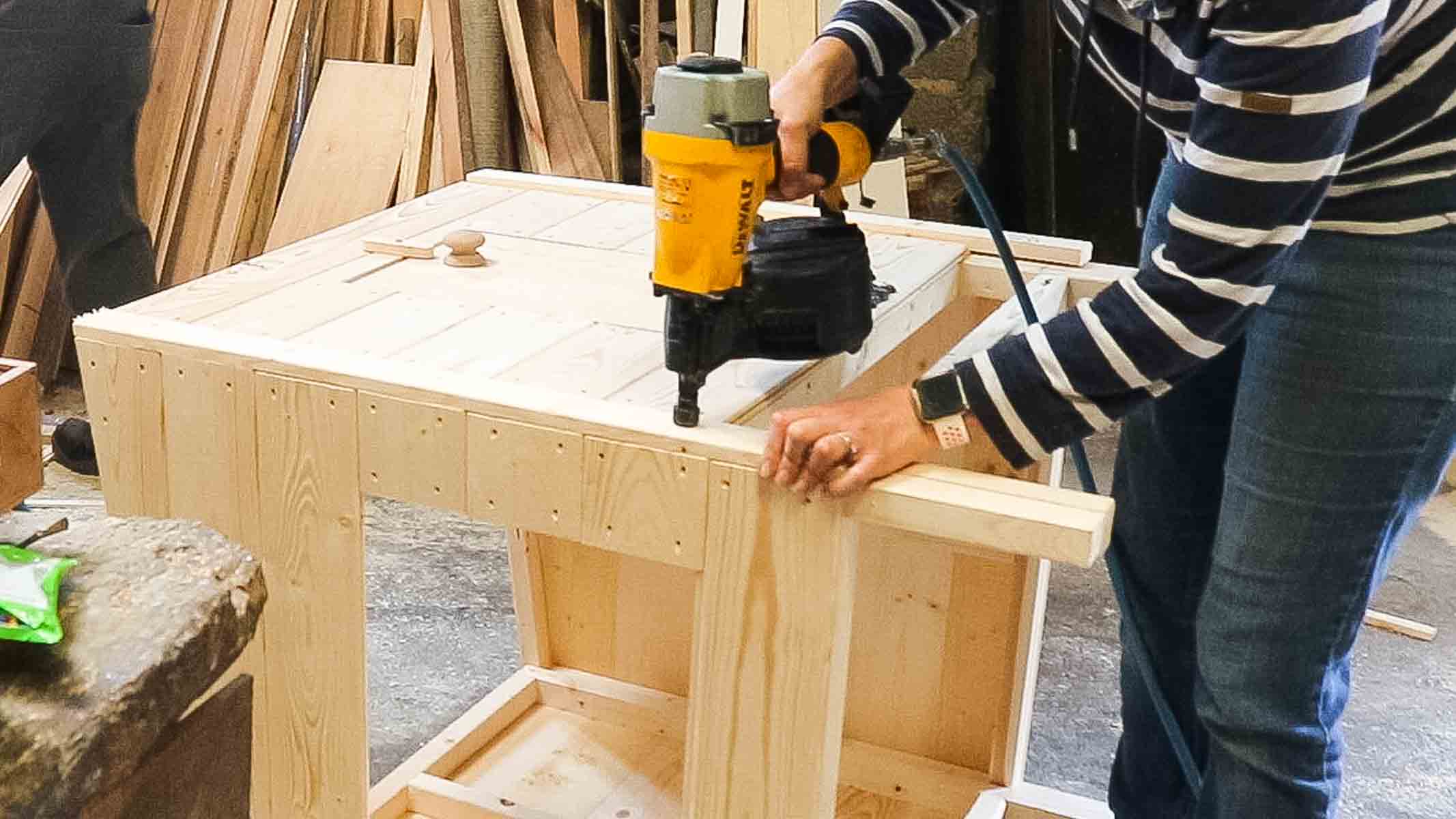 nailing trim to chicken coop