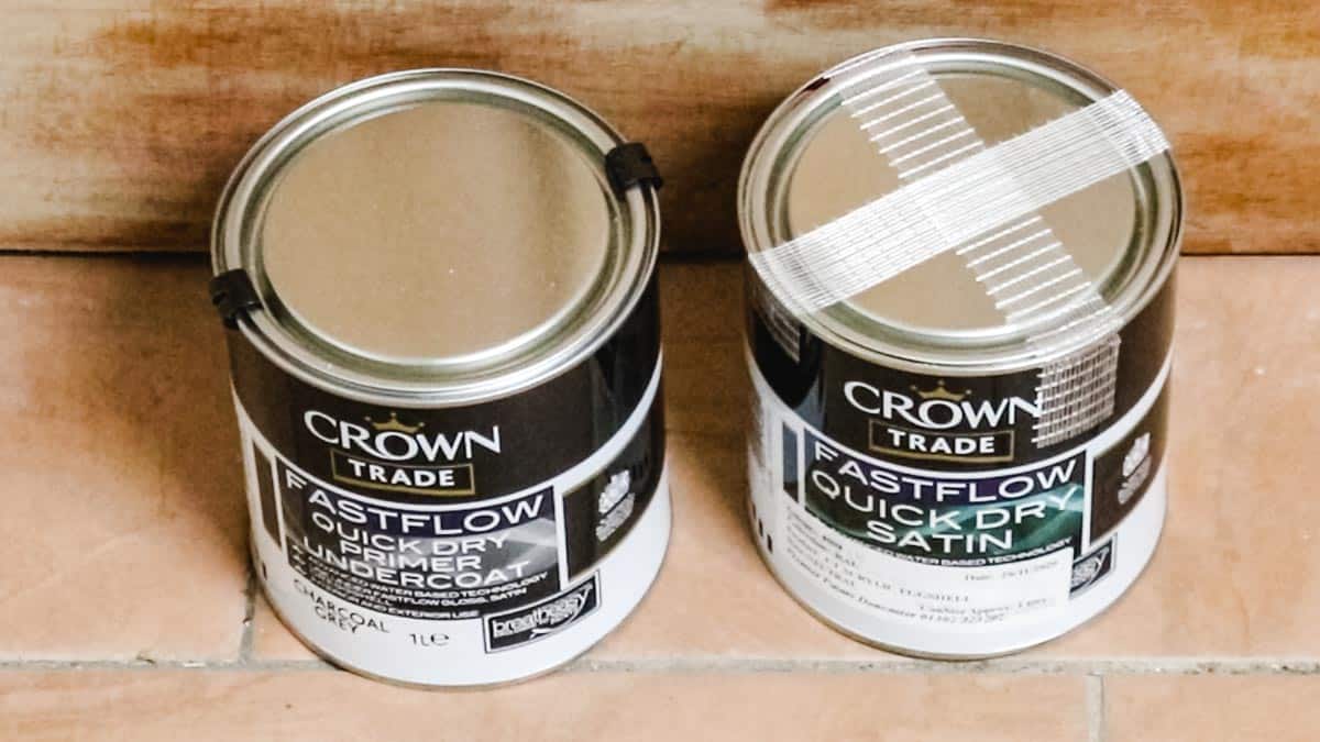 Two tins of Crown Trade water based fastflow quick dry primer undercoat and satin wood paint