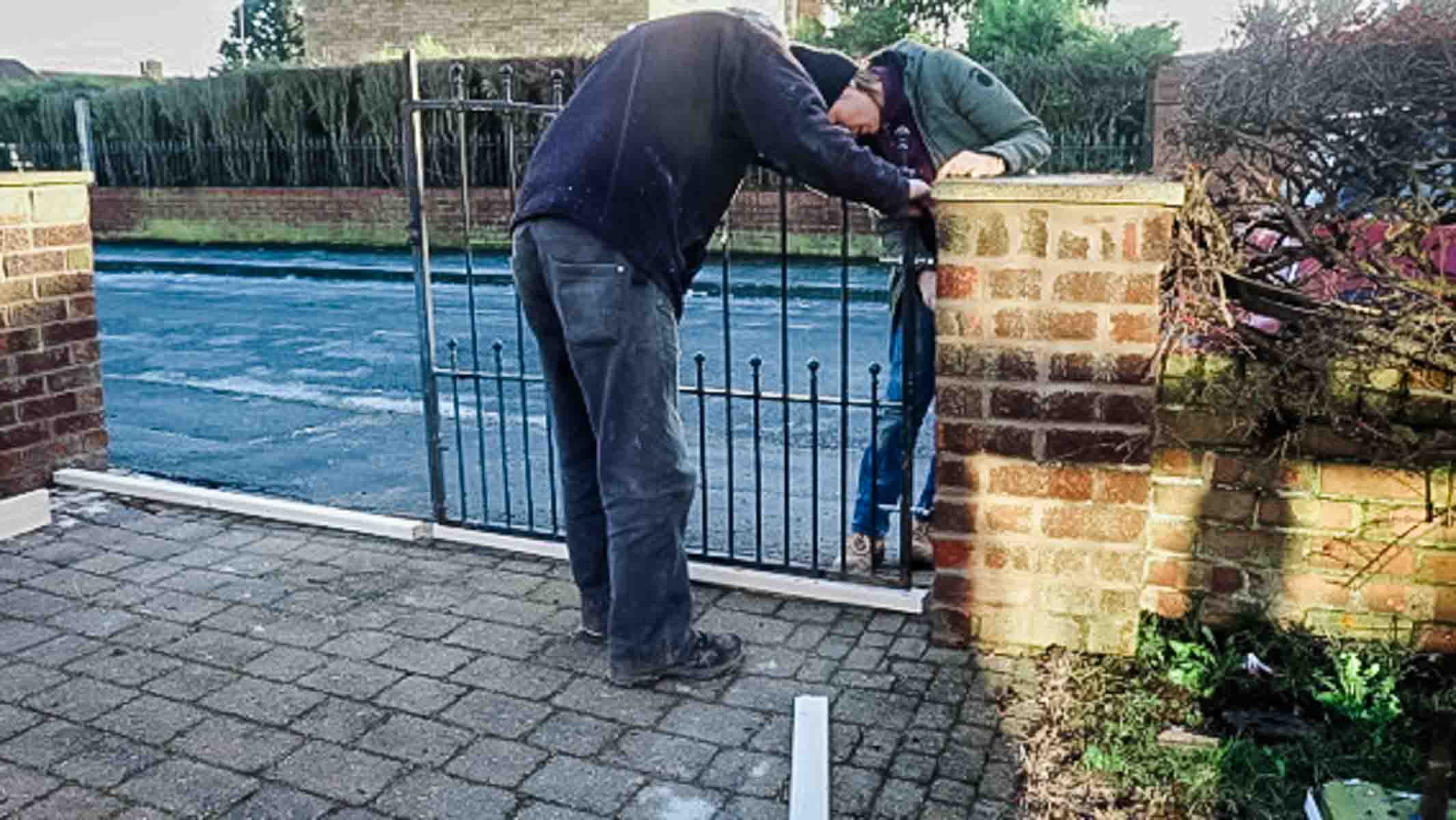 Resting metal gates on timber clearance depth