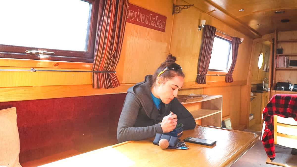 Woman eating at L-shaped dinette