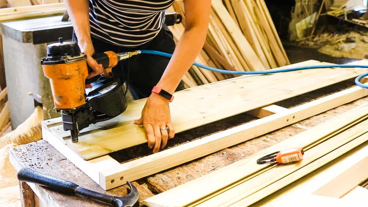 Cladding serving hatch doors with air compressed nailer