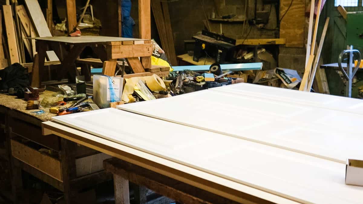 Closet doors laid on framework to plan