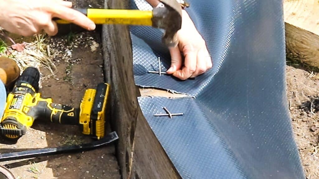 nailing damp proof course down on top of sleepers