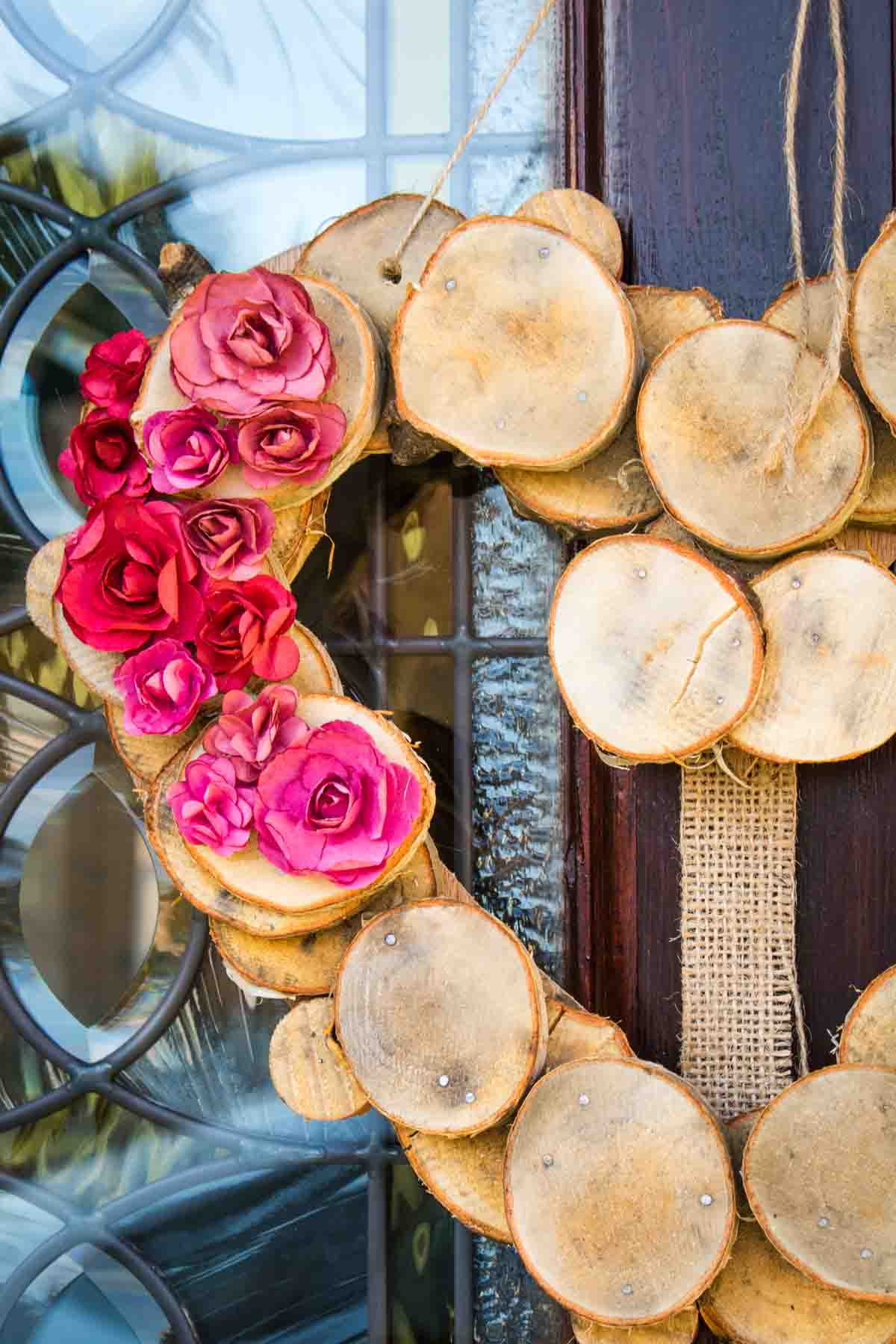 Close up of pink and red roses glued on to a valentine wreath