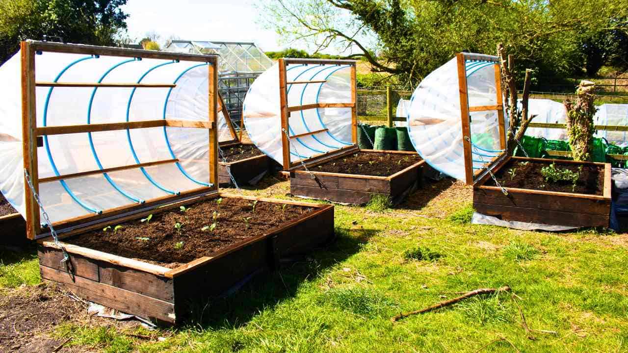 How to Build a DIY Hinged Hoop House for Raised Bed - The Carpenter's ...